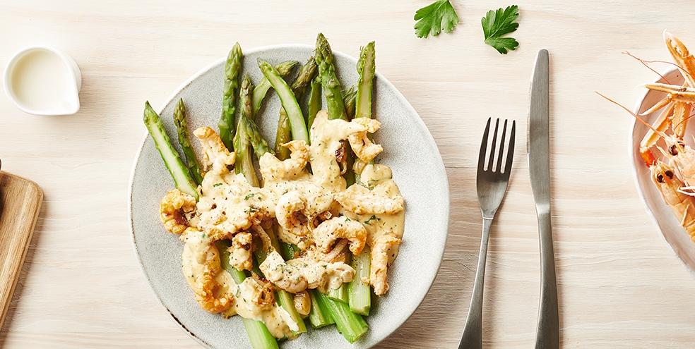 Langoustines poêlées aux asperges vertes et beurre safrané