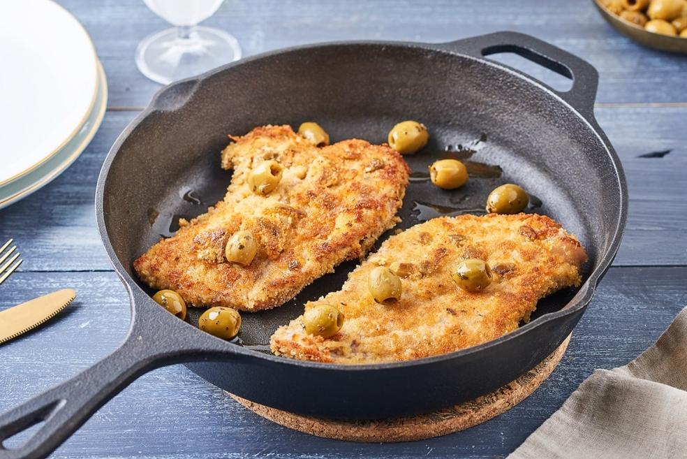 Escalope de veau panée en croûte de parmesan et olives vertes